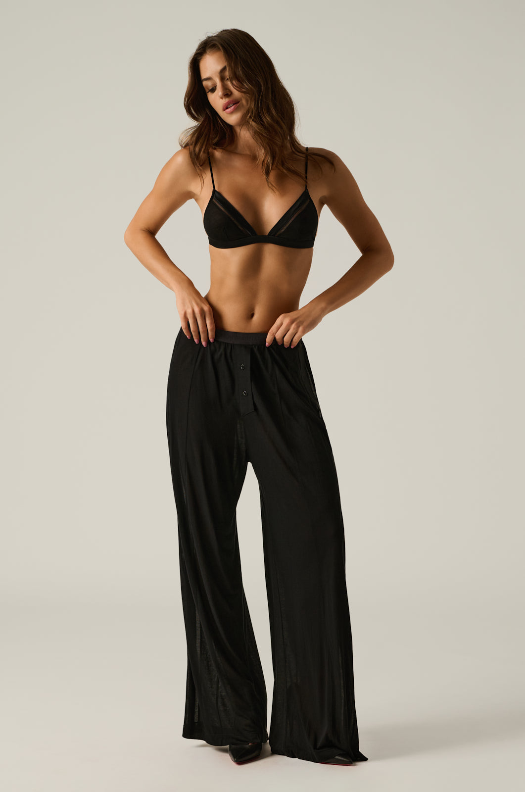 Black loose lounge pant with two button boxer detail.