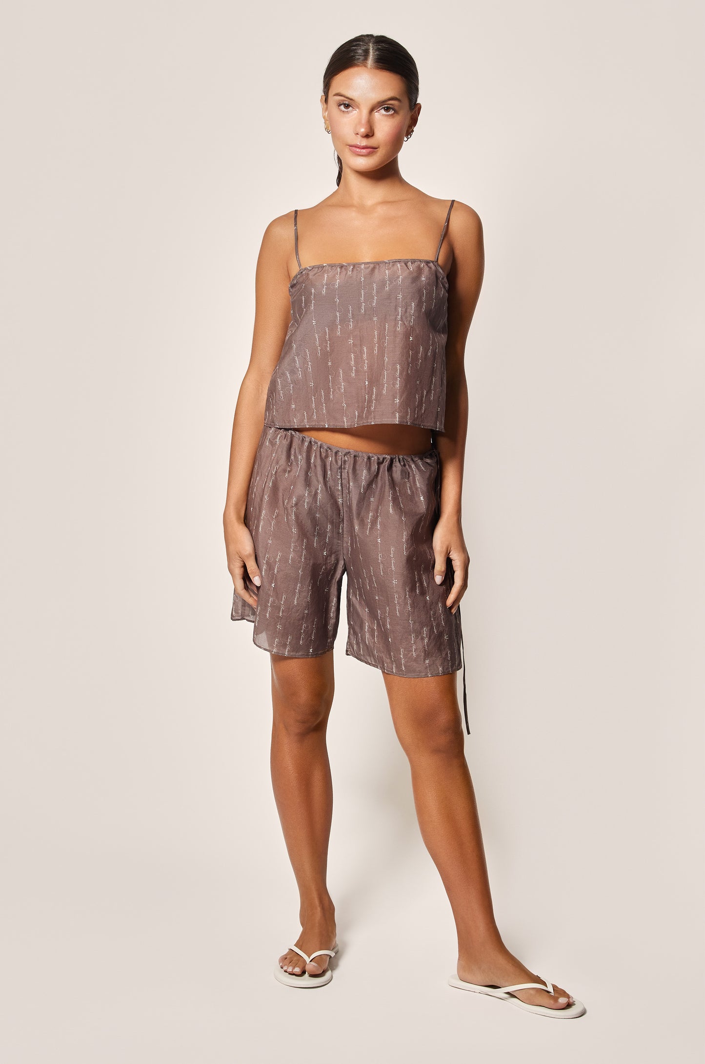 Smoke Grey Cursive Words Joue Avec Moi Printed Loose Sleeveless Crop Top Front