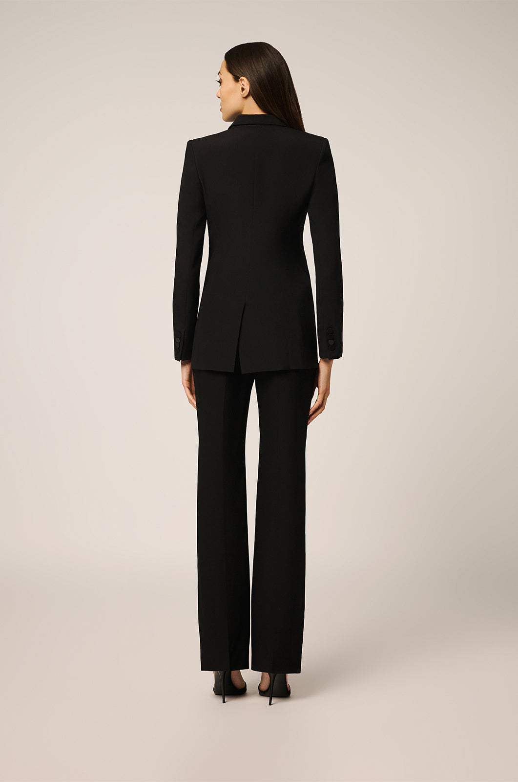 Blazer with double breasted closure in front, back view