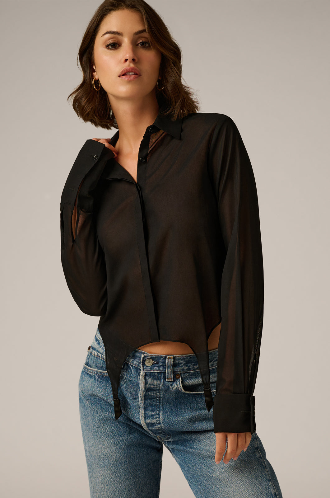 nearly sheer cotton button up with bottom-hem silhouette from a garter