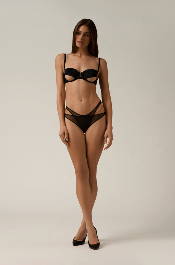 front view of black balconette bra, exposed under chest