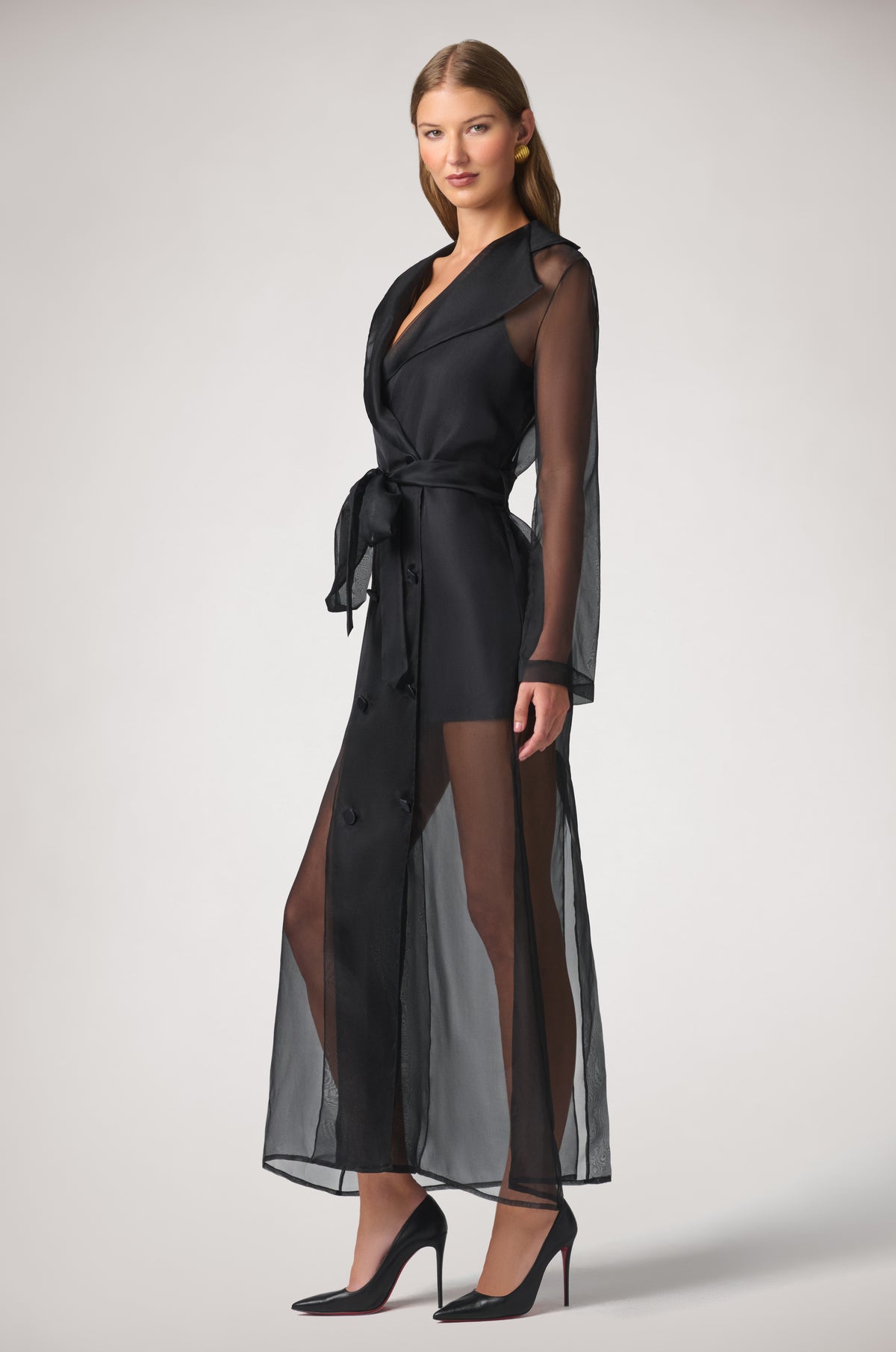 Kiki de Montparnasse Soie Organza Trench Coat in sheer 100% silk organza with a fluid translucent silhouette and waist-defining belt, shown from the side.