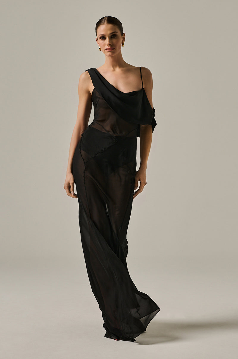 Silk chiffon black tank dress, see-through with lines crossing along body. Off shoulder with one adjustable strap.